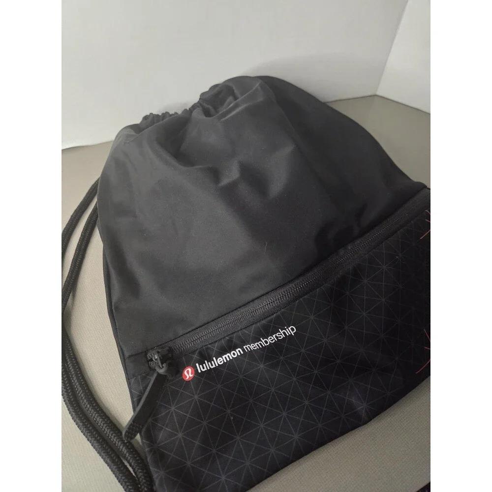 Lululemon Membership Black Nylon Drawstring Bag Zip Pocket String Backpack NWOT